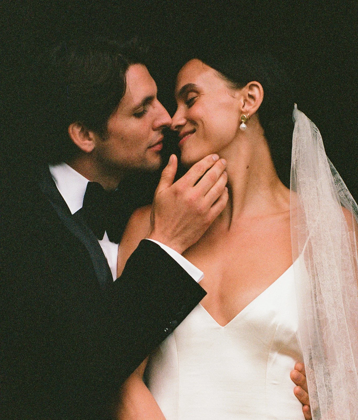  Wedding portrait session photo on 35mm film. bride is wearing Danielle Frankel wedding gown with Jane Rhyan The Collection Veil 