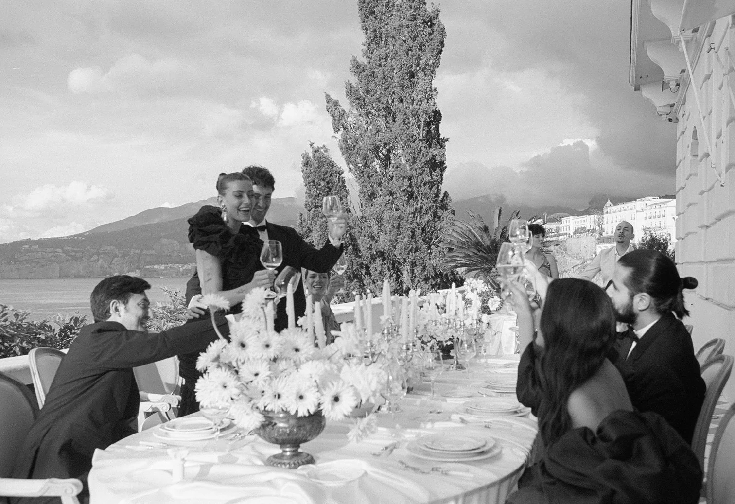  A moment you can almost hear — the laughter, the clink of crystal, the warmth of old friends gathered under the Italian sky. At Villa Astor, dinner is never just dinner; it’s a celebration draped in candlelight, framed by cypress trees and the sea. 